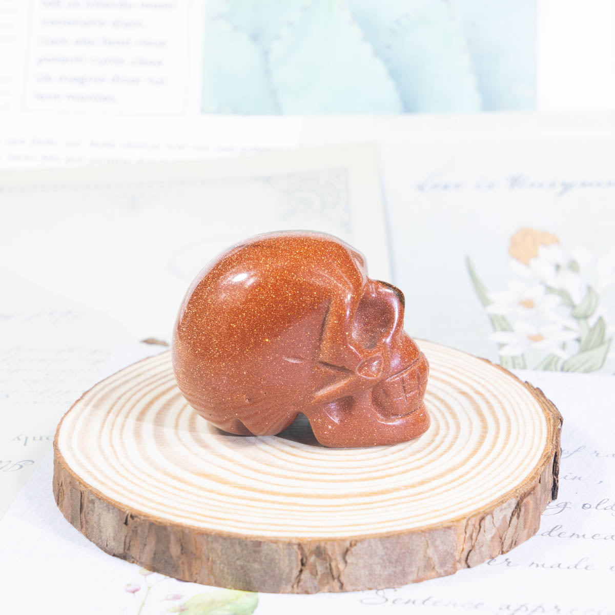 2-Zoll-Schädel aus goldenem Sandstein in loser Schüttung