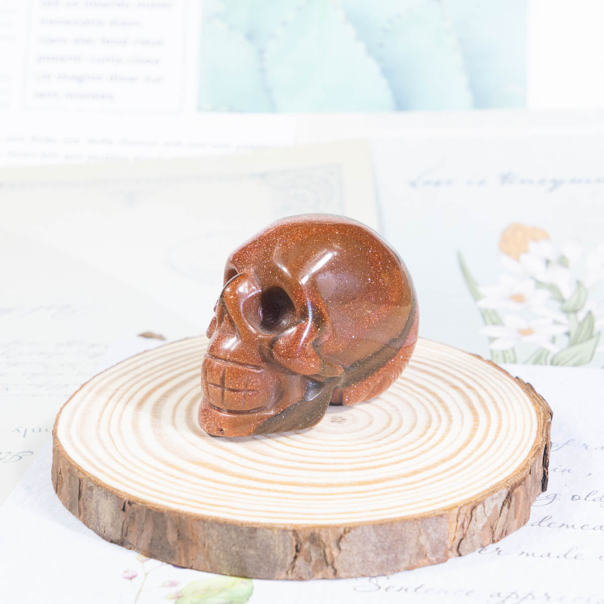 2-Zoll-Schädel aus goldenem Sandstein in loser Schüttung