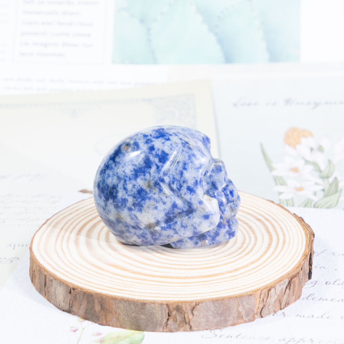 Calavera de piedra con manchas azules de 2 pulgadas a granel