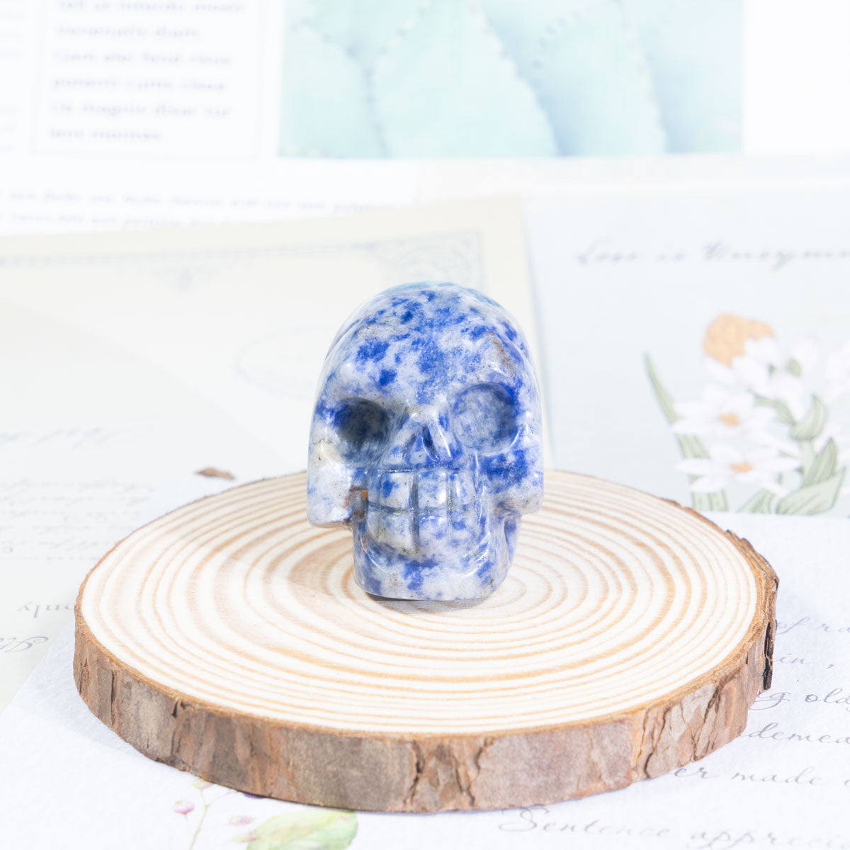Calavera de piedra con manchas azules de 2 pulgadas a granel