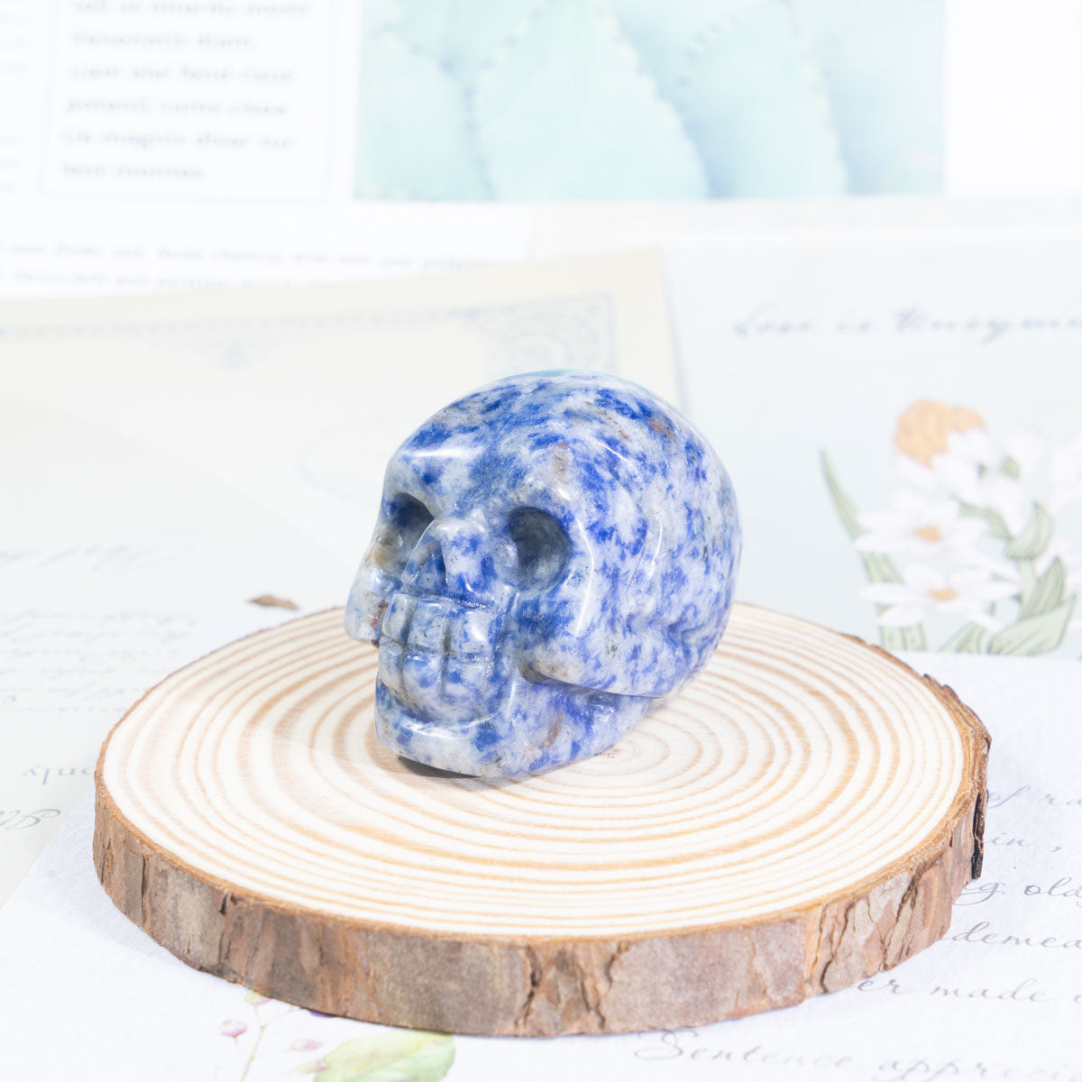 Calavera de piedra con manchas azules de 2 pulgadas a granel
