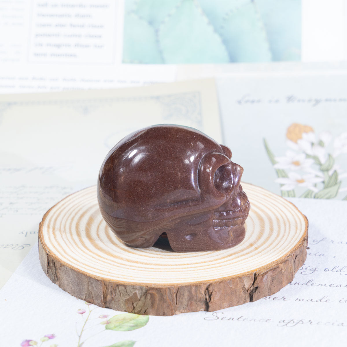 2-Zoll-Erdbeerquarz-Schädel in loser Schüttung