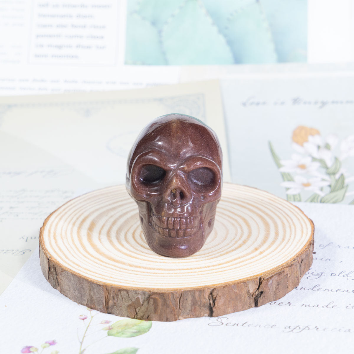 2-Zoll-Erdbeerquarz-Schädel in loser Schüttung