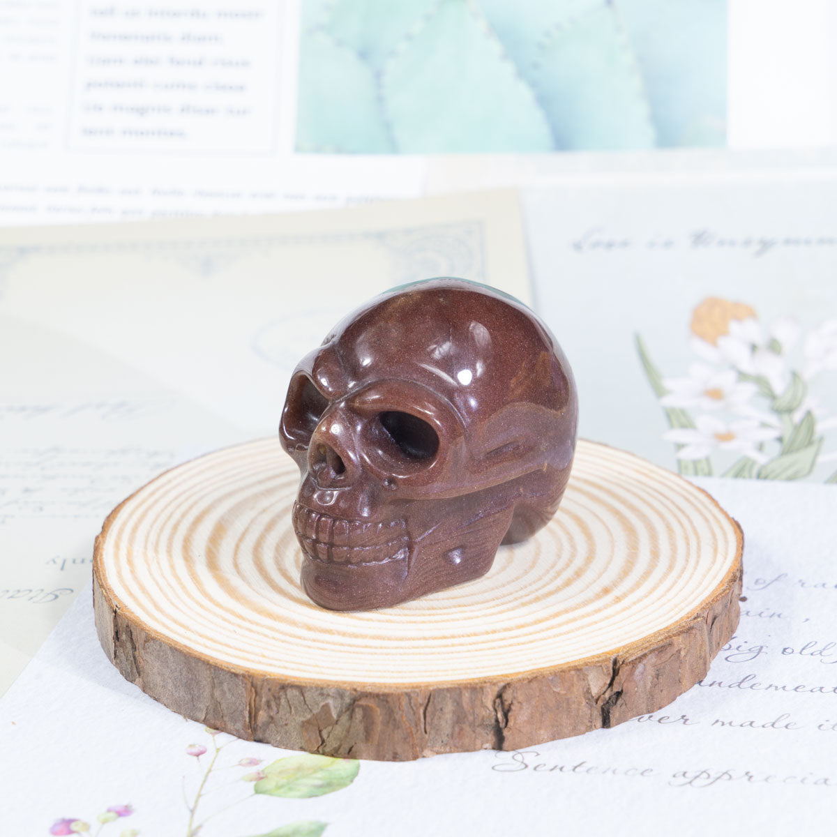 2-Zoll-Erdbeerquarz-Schädel in loser Schüttung