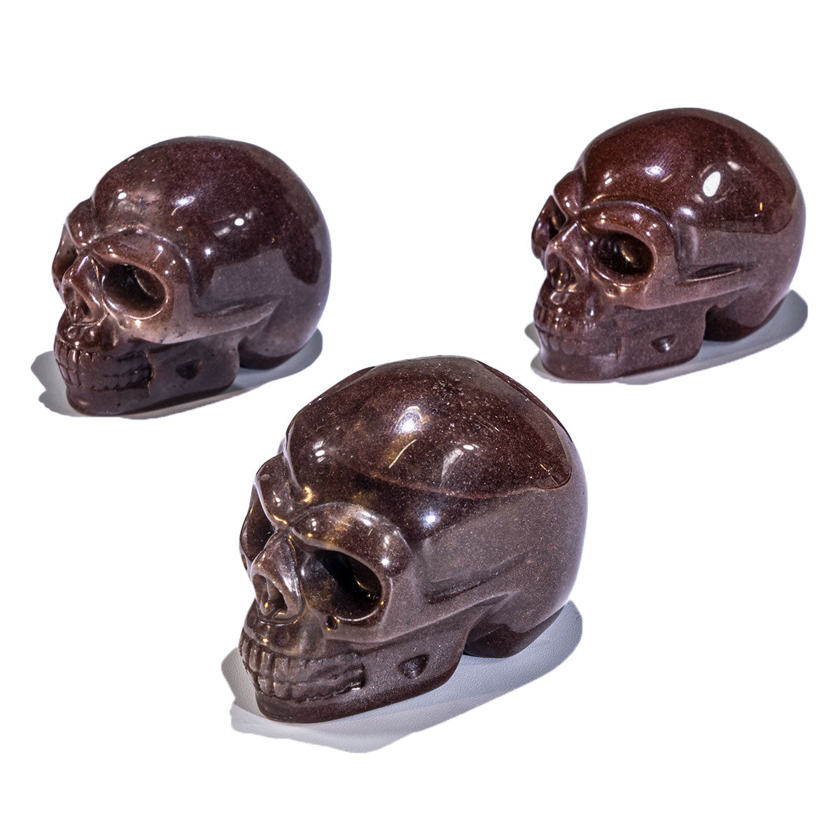 2-Zoll-Erdbeerquarz-Schädel in loser Schüttung