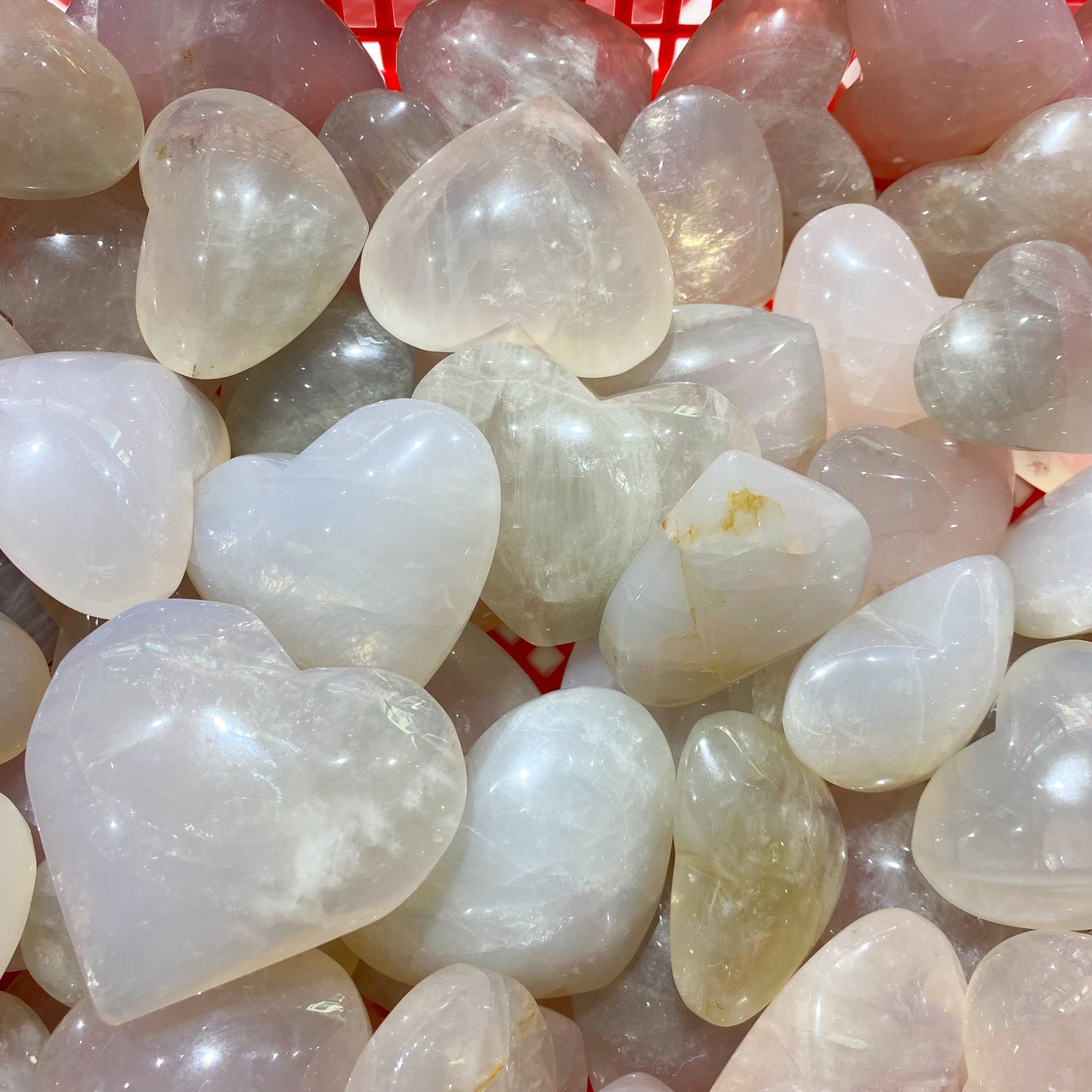 Blauer rosa Quarz-Herz-Palmenstein in loser Schüttung